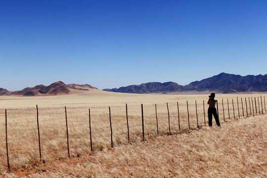 Photographer in a desert landscape
