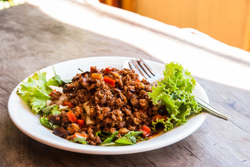 Fried noodles with minced pork and herb