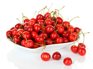 Naklejka na ściany i meble Cherry berries on plate isolated on white