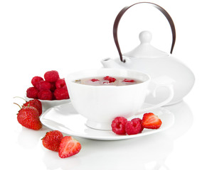 Cup of berry tea isolated on white