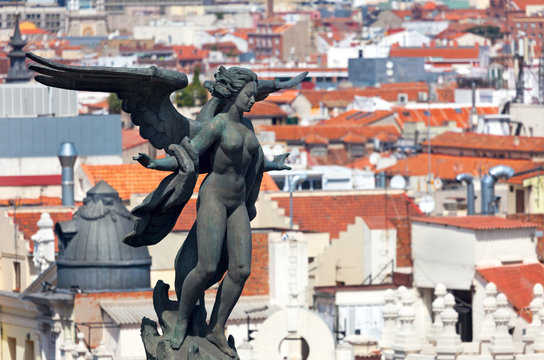 Aerial view of Madrid (Spain) / Famous Statue  and roofs