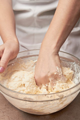 Woman kneading dough