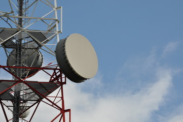 Telecommunication tower with cell phone antenna system