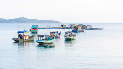Fototapeta na wymiar Idle boats in Hon Mau Island, Nam Du Islands, Vietnam