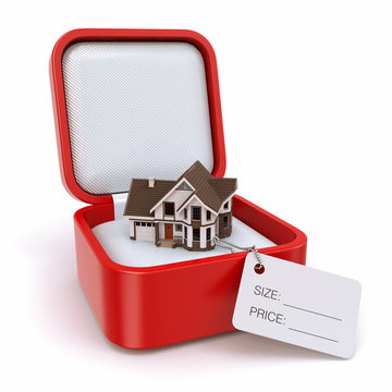 Gift box with house. Real estate concept.