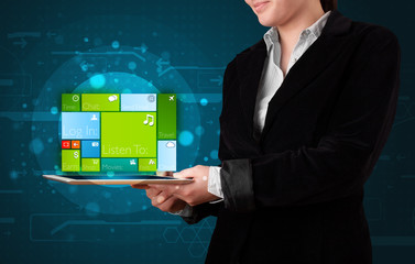Lady holding tablet with modern software operational system