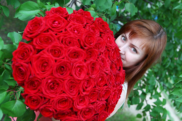 Beautiful woman with roses