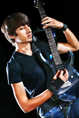 Obraz premium Man playing guitar.