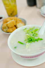 Pork Congee soup with deep fried breads to eat
