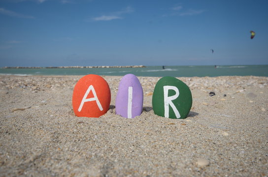 Air concept with three colourful stone letters