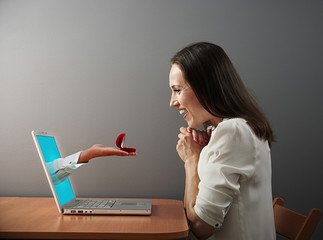 woman looking at ring