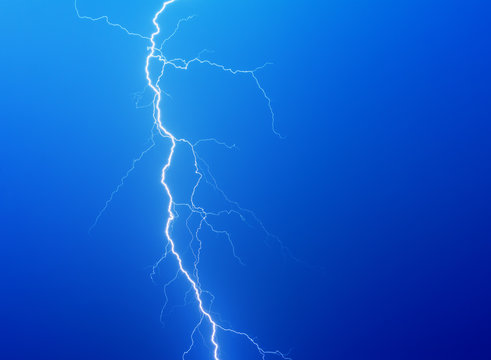 Lightning on a dark blue background