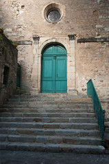 Fototapeta na wymiar porte église Saint-Majan à Villemmagne dans l' Hérault