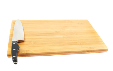 Steel kitchen knife on cutting board
