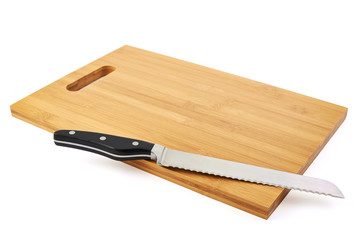 Steel kitchen knife on cutting board