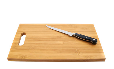 Steel kitchen knife on cutting board