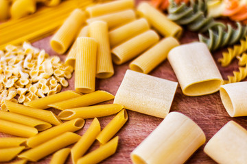 Pasta on Wooden Board. Selective Focus