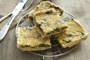 Traditional greek spinach pie with parmesan cheese