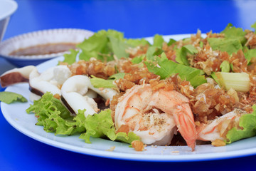 Boiled seafood on white dish