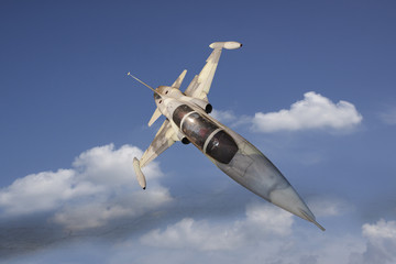 military jet plane flying over white cloud