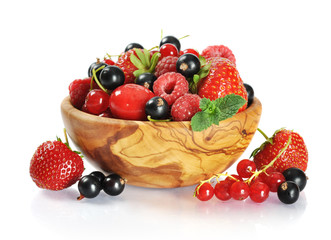 Wooden bowl with berries mix