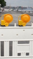 road barrier - two yellow warning lights