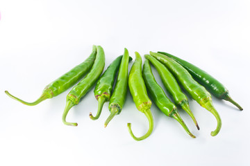 Red and green pepper on a white background