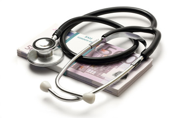Stethoscope and euro banknotes cash closeup
