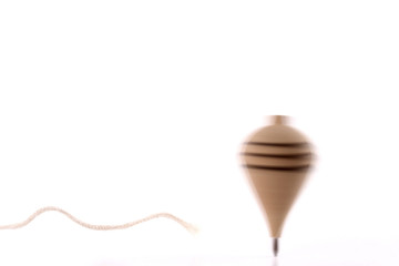 Throwing a spinning top
