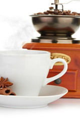 coffee beans with wooden coffee grinder and coffee cup.