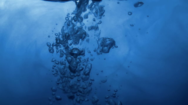water splash with bubbles of air in motion