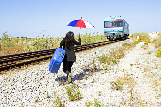 Young Woman Running After The Train