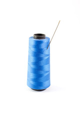 blue thread and needle