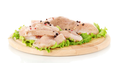 Chicken meat on board isolated on white