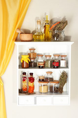 Fototapeta na wymiar Variety spices on kitchen shelves