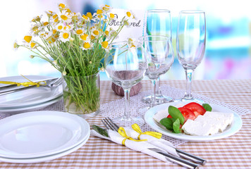 Table setting with chamomiles