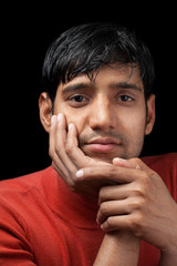 Indian man relaxed and thinking