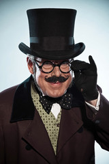 Funny vintage dickens style man with mustache and hat. Wearing g