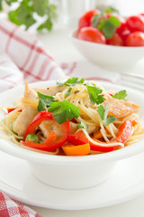 Pasta with chicken and vegetables.