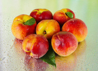 Peaches on metal green background