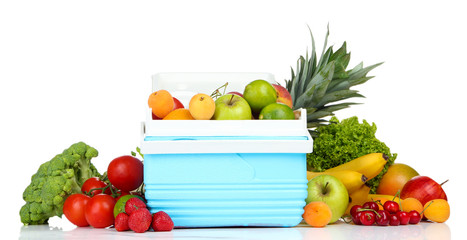 Fresh fruits and vegetables in mini refrigerator, isolated