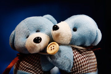 two bears on blue gradient