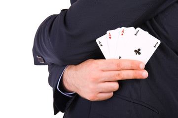 Businessman showing playing cards.