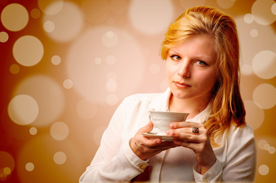 Attractive woman with a cup of coffee