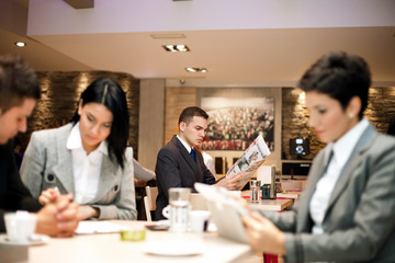 Business people in cafe