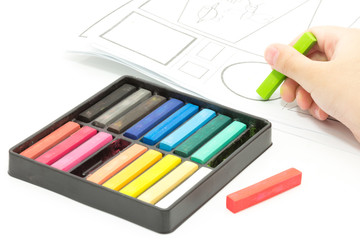 Naklejka premium colorful crayon to paint the paper