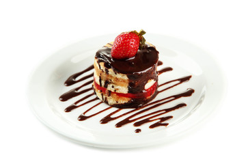 Tasty biscuit cake with chocolate and berry