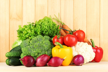 Fresh vegetables on wooden background