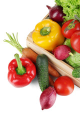 Fototapeta na wymiar Fresh vegetables in wooden box on grey background