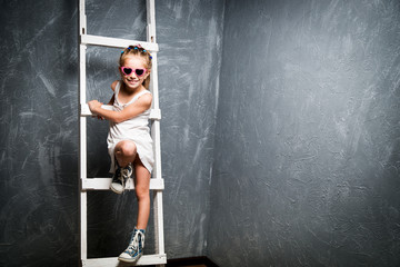 little girl on stairs
